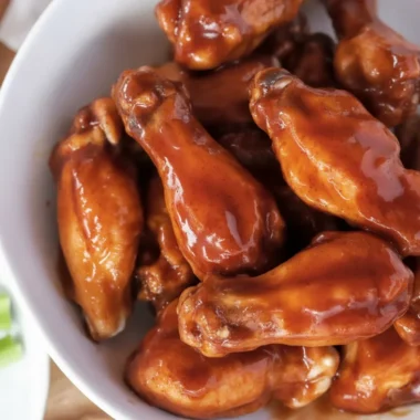 Crispy Buffalo Wings served with tangy sauce and blue cheese dipping sauce.