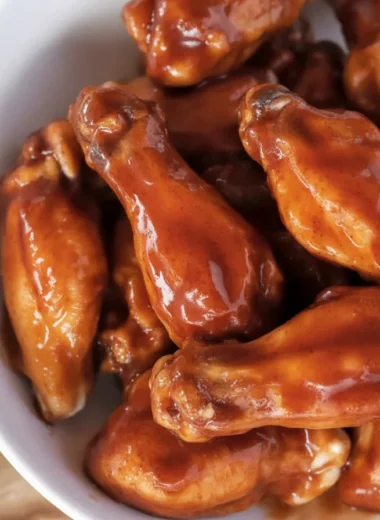 Crispy Buffalo Wings served with tangy sauce and blue cheese dipping sauce.