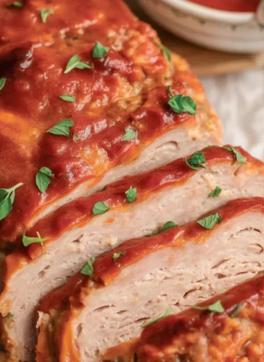 Juicy and flavorful turkey meatloaf served with a sweet-tangy glaze.
