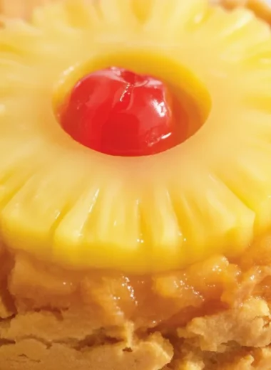 Pineapple Upside Down Sugar Cookies topped with pineapple rings and cherries