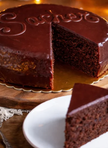 Classic Sachertorte, an Austrian chocolate cake with apricot filling and chocolate glaze.