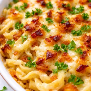 Delicious Authentic Käsespätzle, a German Mac and Cheese recipe with cheese and caramelized onions.
